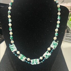 Elegant Beaded Necklace with Turquoise and Cream Accents